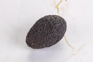 Ripe raw whole avocado fruit photo