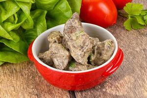 Chicken liver with cream sauce photo