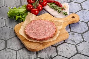 Raw beef uncooked burger cutlet photo