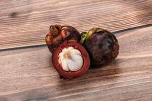 Tropical exotic purple sweet mangosteen photo