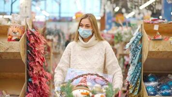 a woman with long blonde hair walking through a store video