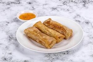 Traditional crispy fried stuffed springroll photo