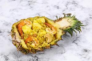 Thai cuisine - rice with prawn in pineapple photo