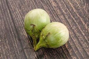 Raw green round eggplant vegetable photo