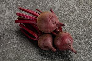 Young raw beetroot heap isolated photo