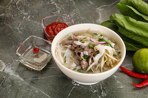 Vietnamese soup Pho Bo with beef photo