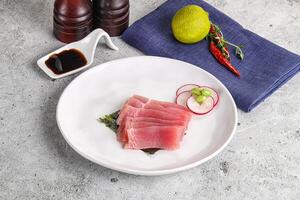 Japanese cuisine - sliced tuna sashimi photo