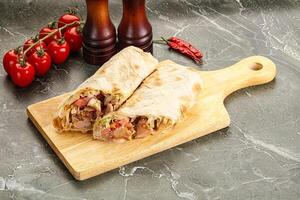 Shawarma with grilled chicken meat photo