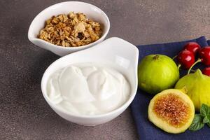 Traditional homemade Greek yoghurt with granola photo