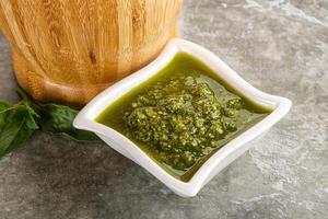 Homemade vegetarian basil pesto sauce photo