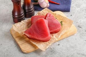 Delicous raw tuna steak for cooking photo