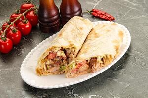 Shawarma with grilled chicken meat photo