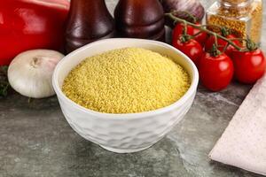 Raw dry wheat couscous grain photo