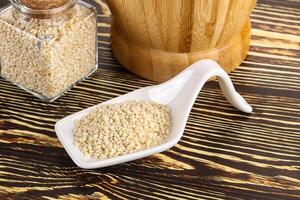 Sesame seeds heap in the bowl photo