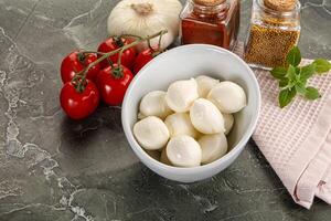 Mini mozarella cheese bolls heap photo