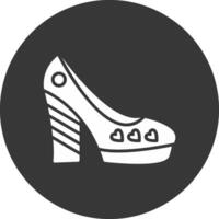 Zapatos glifo invertido icono vector