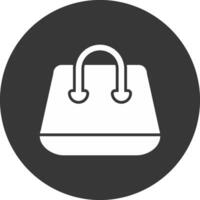 icono de glifo de bolsa de compras invertido vector