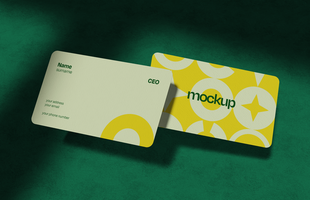 Rounded Corner Business Card Floating on Textured Surface psd