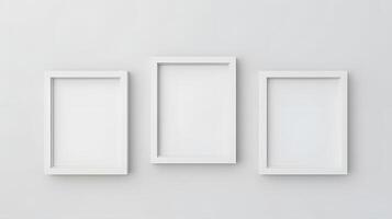 Three empty photo frame mockup on a white wall. Minimal home interior.