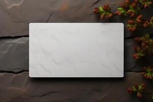 Business card mockup on a stone background, top view. White marble namecard design mock up presentation photo