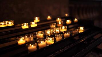 Prayer candles in Catholic church video