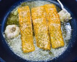 Fresh Salmon filet with herbs and spices photo