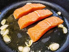 Fresh Salmon filet with herbs and spices photo