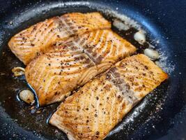 Fresh Salmon filet with herbs and spices photo