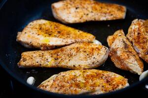 fresh chicken with herbs and spices photo