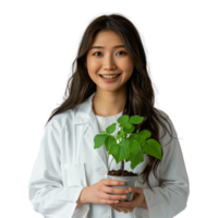 Smiling woman scientist holding green plant in laboratory png