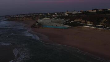 pôr do sol em a de praia praia grande, Portugal. lindo pôr do sol em a Português de praia praia grande, dentro Portugal. video