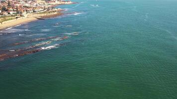 Aerial view of wave on the beach with sand and turquoise waves video