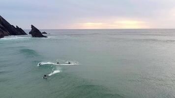 Drone flying low over ocean waves breaking near shore. video