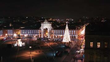 Aerial view on illuminated Christmas tree in Lisbon on Commerce Square, video