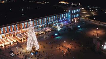 Aerial view on illuminated Christmas tree in Lisbon on Commerce Square, video