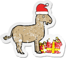 retro distressed sticker of a cartoon christmas donkey png