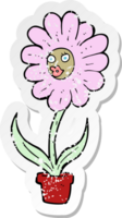 retro distressed sticker of a cartoon flower png