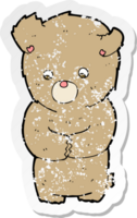 retro distressed sticker of a cartoon shy teddy bear png