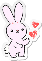 distressed sticker of a cute cartoon rabbit with love hearts png