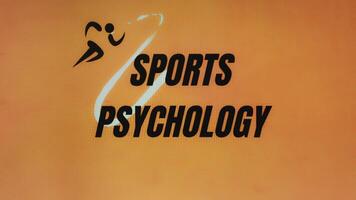 Sports Psychology inscription on orange background with running man symbol. Sports conception video