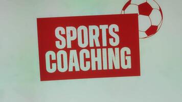 Sports Coaching inscription on red and white background with football ball symbol. Sports concept video