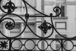 a decorative nostalgic metal fence in the city photo