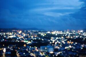 Blurring of night lights, background of the city view with the secret light of the evening photo