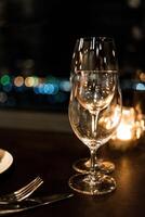 Transparent wine glasses with bokeh. photo