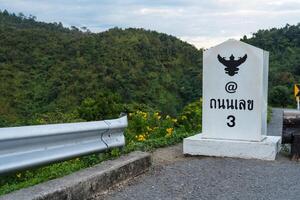 Road no.3 or sky road over top of mountains with green jungle in Nan province, Thailand. photo