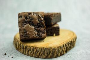 Chocolate brownie topping with chocolate chips photo