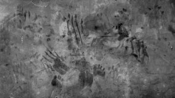 Thriller evil hand on wall texture, spooky wall background photo