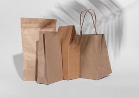 Kraft paper bag, pouch, sack, box. Brown beige eco package, packs for product, gifts photo