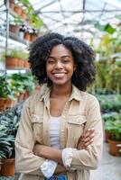 Black Business Woman in a Garden Center Surrounded by Greenery photo