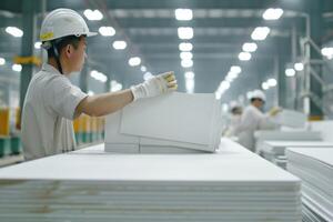 User worker on the calcium silicate sheet production photo